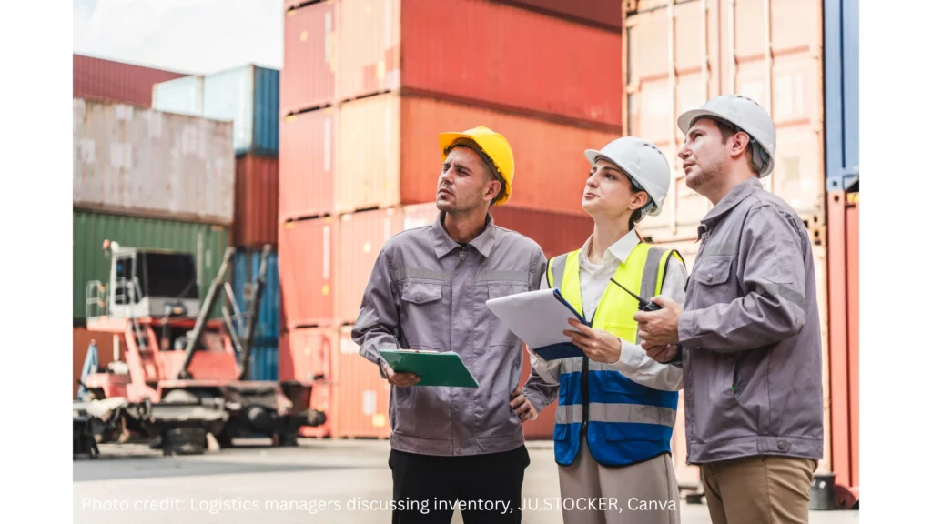 A photo showing logistics managers discussing container shipment and inventory