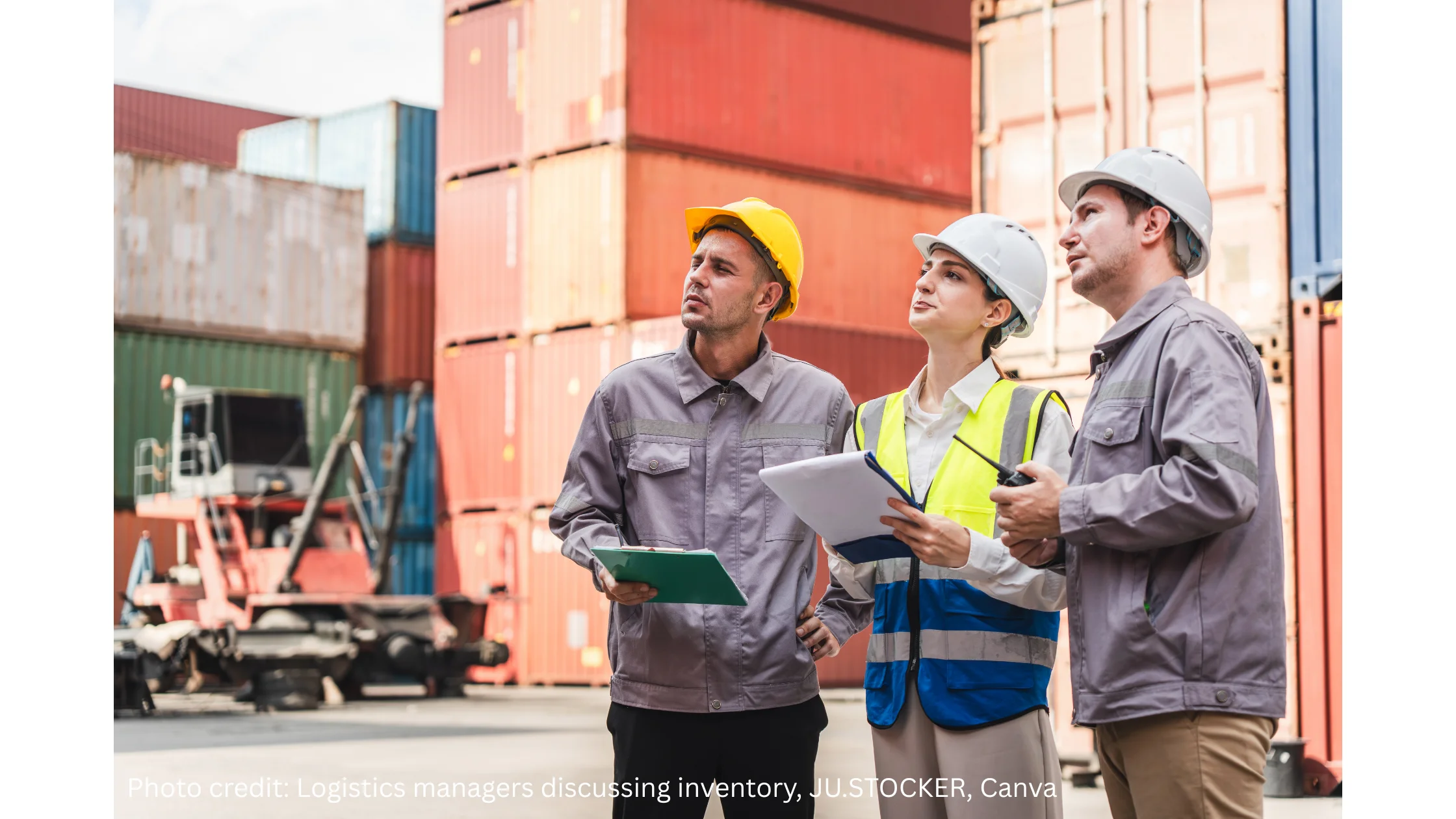 A photo showing logistics managers discussing container shipment and inventory